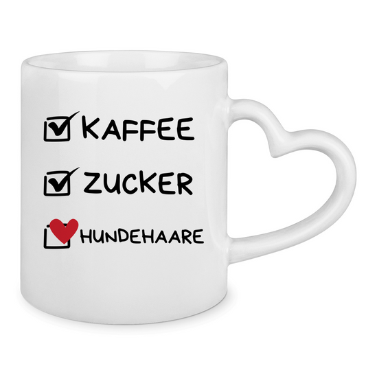 Tasse mit Herzhenkel Kaffee, Zucker, Hundehaare